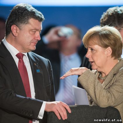 Порошенко и Меркель за скорейшую встречу "четверки" 